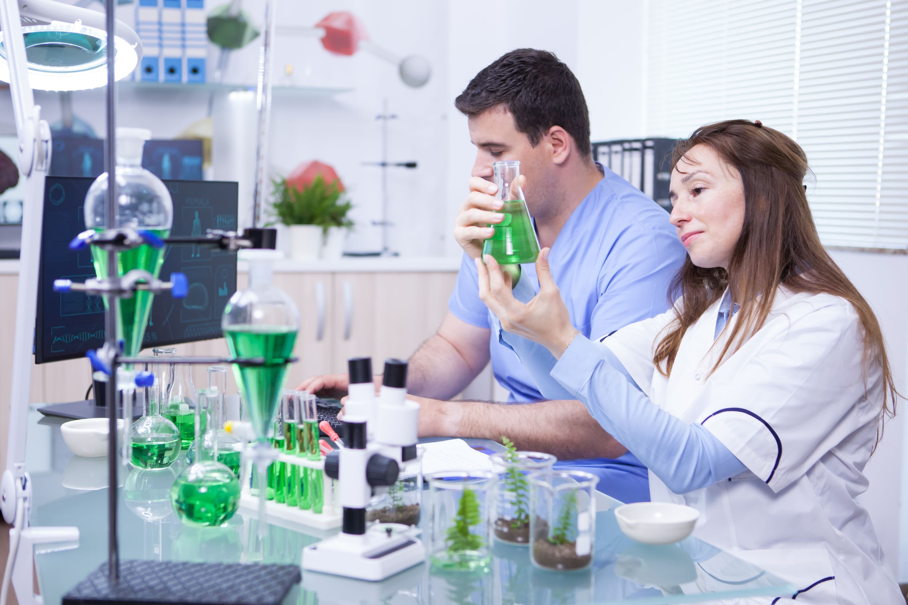 Medical researchers conducting laboratory testing and pharmaceutical analysis with scientific equipment, supporting precision medicine, diagnostics, and healthcare innovation