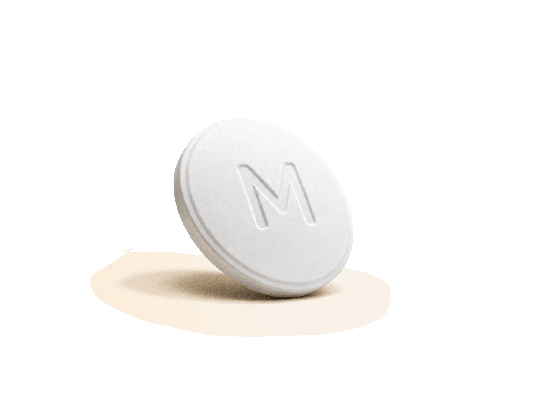 White round tablet with embossed 'M' logo.